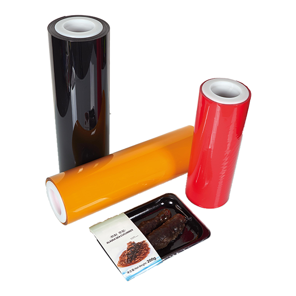 Three rolls of COEX FILM in black, yellow, and red are displayed beside a packaged tray with delicatessen delights inside