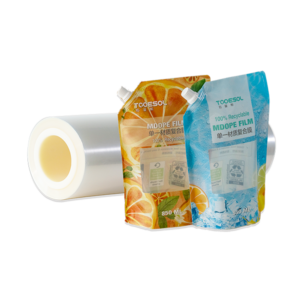 Transparent film roll and two orange and blue Spout Pouches are made of MDOPE, highlighting the 100% recyclable packaging